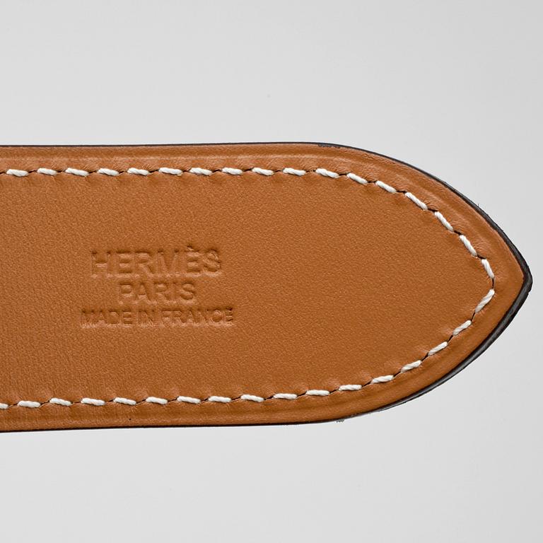 HERMÈS, a pink coral leather belt, "Etrivière".