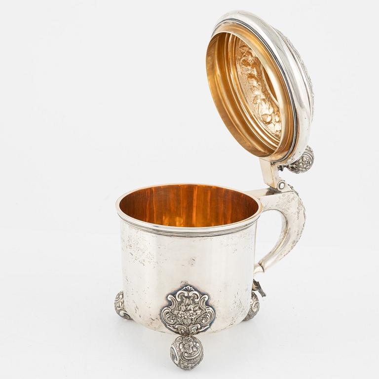 A silver tankard. 1902.