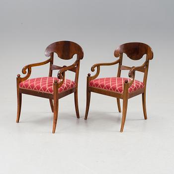 A pair of Karl Johan mahogany armchairs first half of the 19th century.