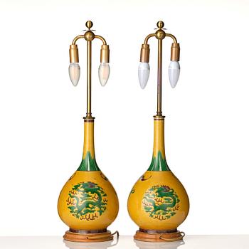 A pair of late yellow ground vases with five clawed dragons, late Qing dynasty.