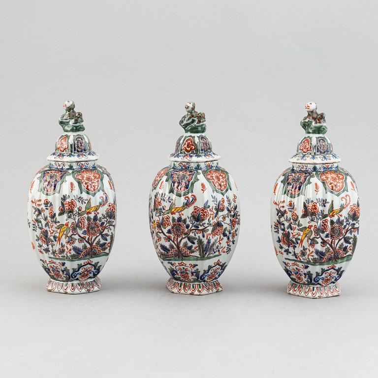 A five piece french faience garniture.