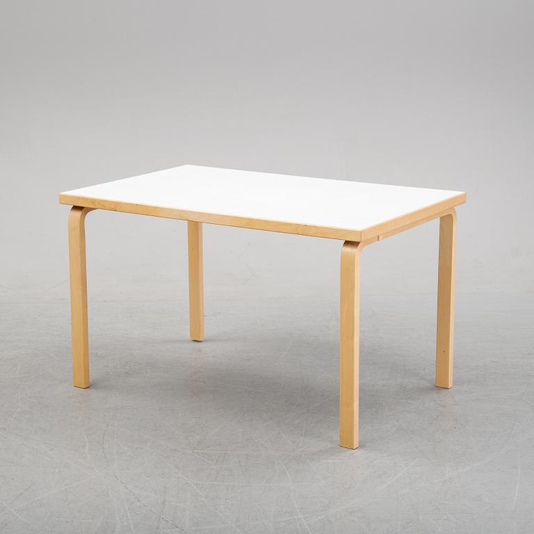 An 'Aalto' table and four chairs model 66 by Alvar Aalto for Artek, designed 1935.