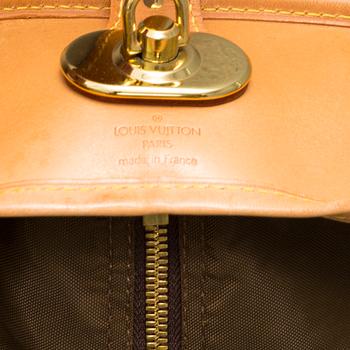 LOUIS VUITTON, a 'Housse Porte-Habits' garment bag.