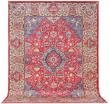 A Kashmar carpet, c. 390 x 298 cm.