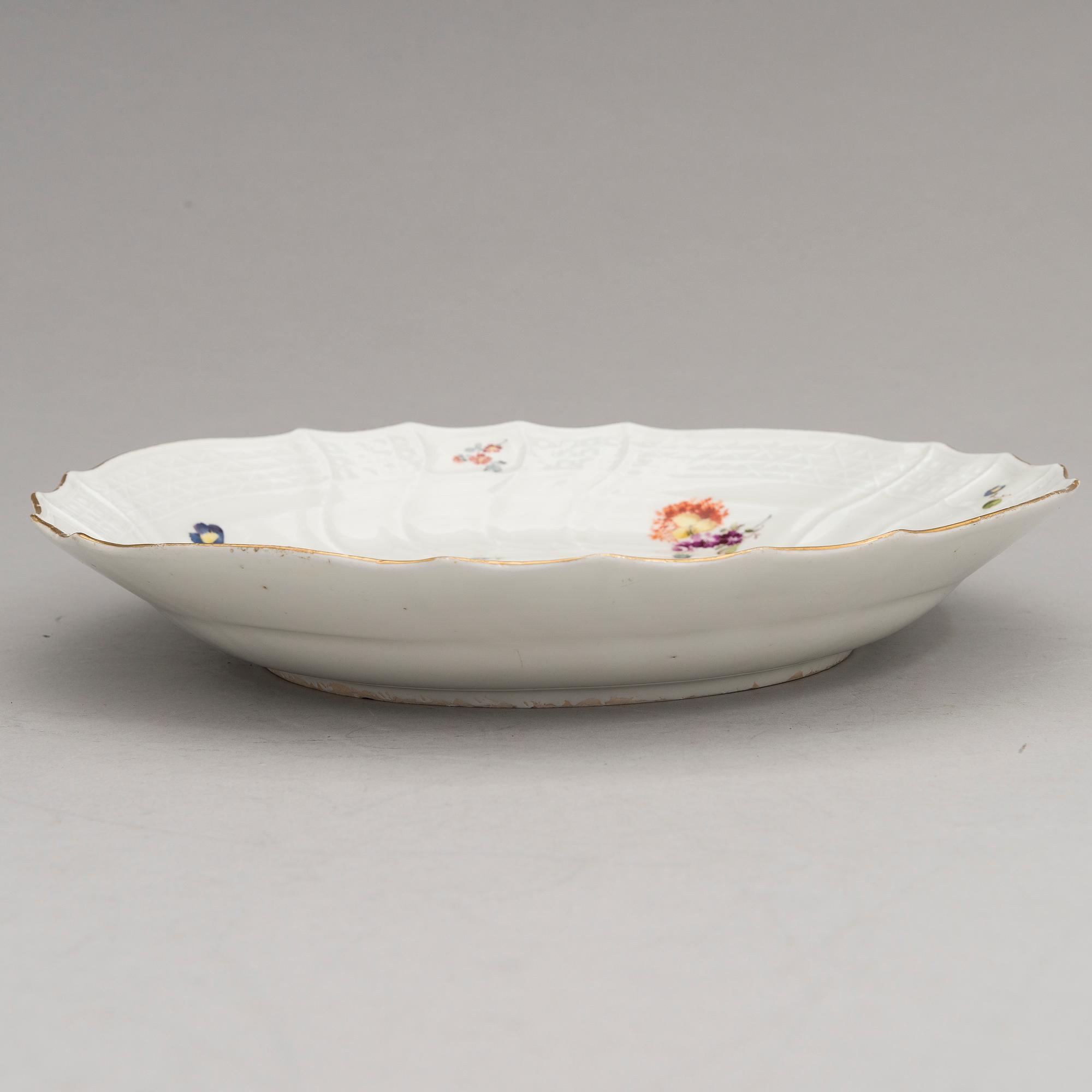 Two Meissen porcelain vases, a platter, an urn and a lidded box from the latter half of 20th century.