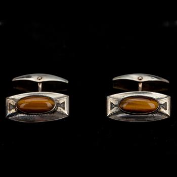 MANSCHETTKNAPPAR, 2 par, silver och tigeröga. Finska stämplar 1961, 1963.