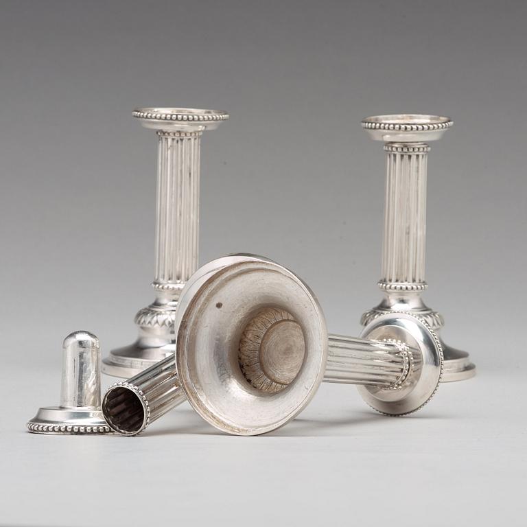 A matched set of four Gustavian silver candlesticks,