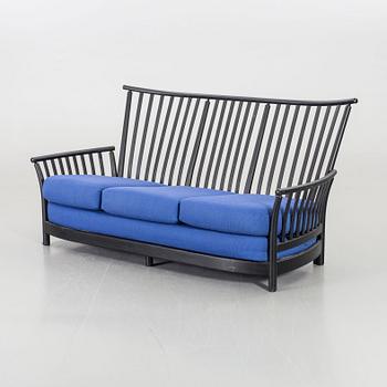 A LUCIAN ERCOLANI SOFA.