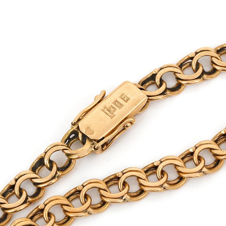 ARMBAND, 18K guld, otydlig namnstämpel, 1963. Vikt ca 14g.