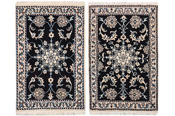 A pair of rugs, Nain, part silk, ca. 89 x 57 cm & ca. 90 x 60 cm.
