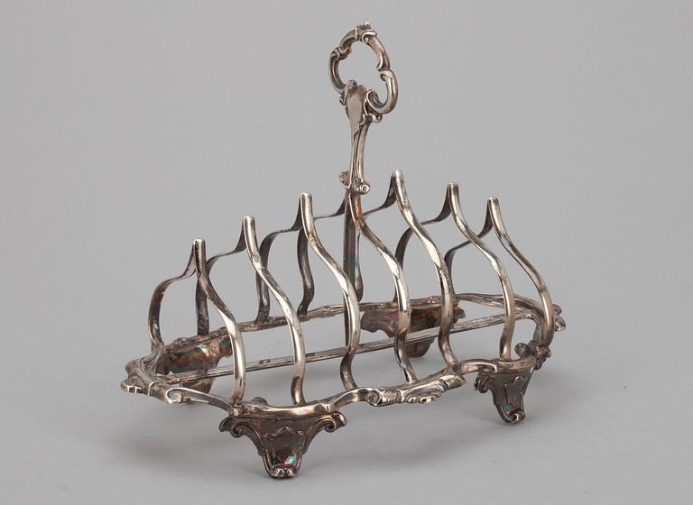 TOASTRACK, silver, London 1859. Vikt 274 g.
