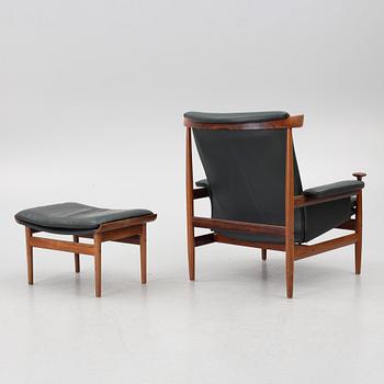 Finn Juhl, a 'Bwana' armchair and ottoman, France & Son, Denmark, 1960's.