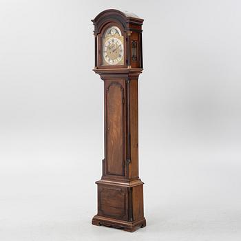 A mahogany veneered longcase clock, marked Peter Pohlmann, London, England, 18th century.