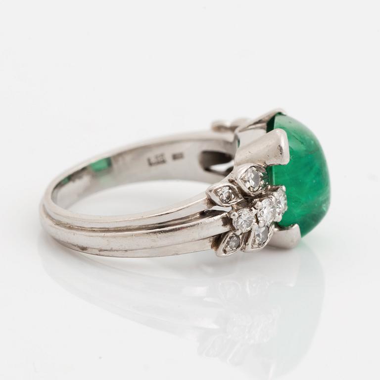 A WA Bolin 18K white gold ring set with a cabochon-cut emerald.