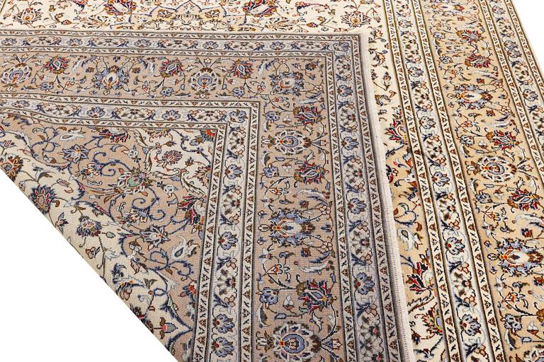 A Keshan carpet, c. 348 x 240 cm.