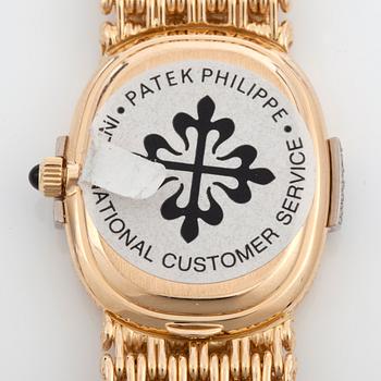 A Patek Philippe Golden Eclipse ladie's wristwatch set with brilliant-cut diamonds. Total carat weigt 0.15 ct. Onyx dial.