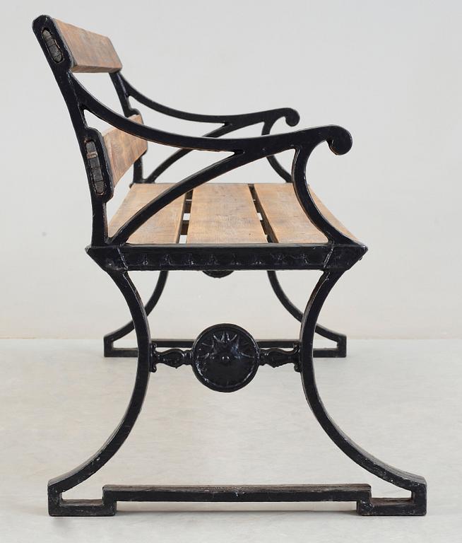 A Folke Bensow cast iron and stained wood park bench, Näfveqvarn.