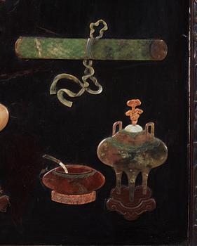 A framed rectangular plaque with hardstone and mother of pearl inlay, late Qing dynasty (1644-1912).