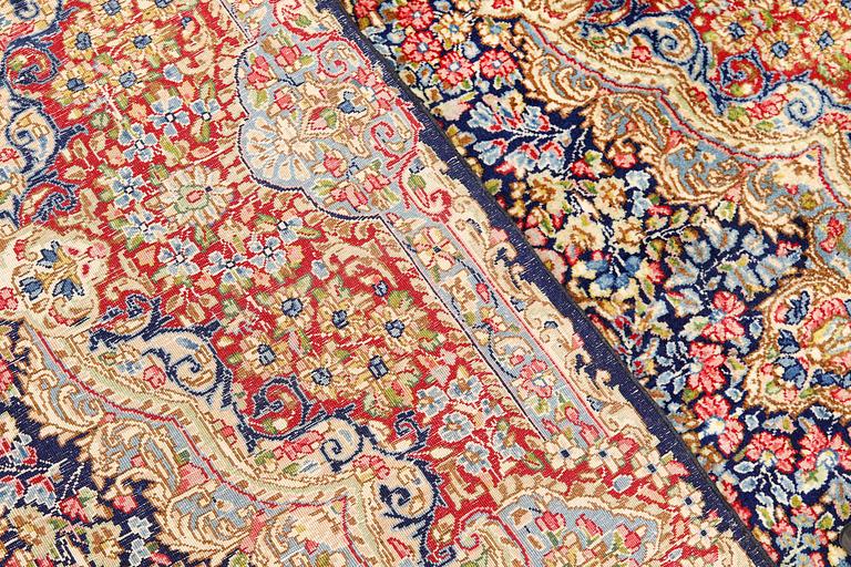 A Kerman carpet of 'Millefleur' desig, c 386 x 303.