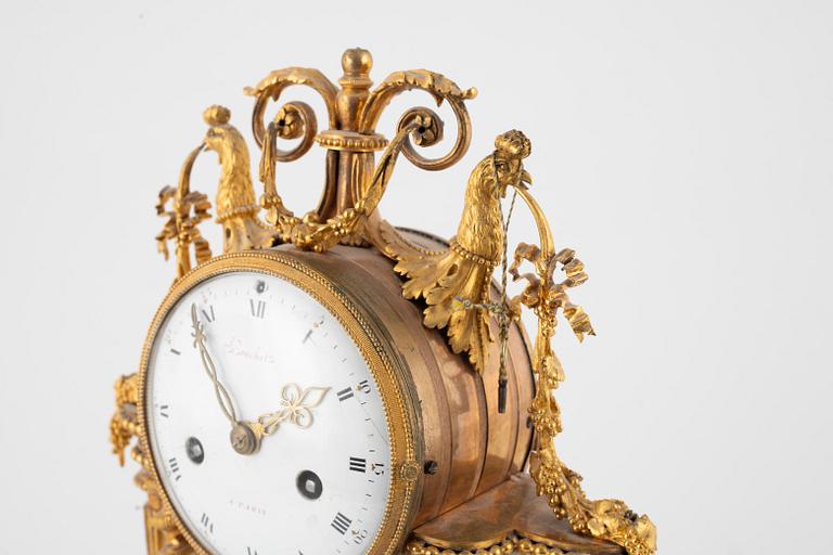 A Louis XVI marble and ormolu portico clock, the dial signed Bouchet, late 18th century.