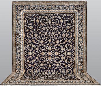 A Keshan carpet, c. 450 x 322 cm.
