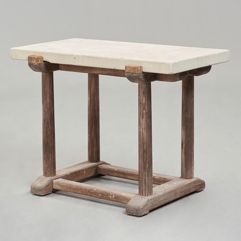 Axel Einar Hjorth, a "Sandhamn" stained pine table with a limestone top, Nordiska Kompaniet, Sweden 1929.