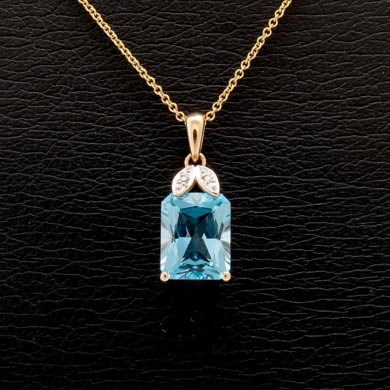 Necklace 14K gold with step-cut blue topaz and round brilliant-cut diamonds.