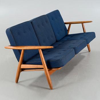 A "GE-240/3" sofa, designed by Hans J Wegner for Getama.