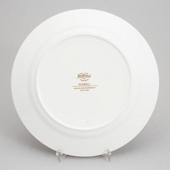 KARIN BJÖRQUIST, plates, (14 [12+2]), bone china, "Nobel Jubilee 1991"+"Nobel", Rörstrand/Gustavsberg.