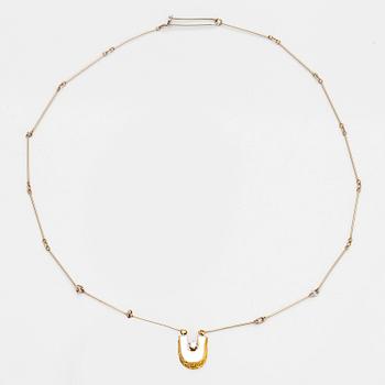Juhani Linnovaara, "Legato", halssmycke, 18K guld, briljantslipad diamant, Lapponia 1978.