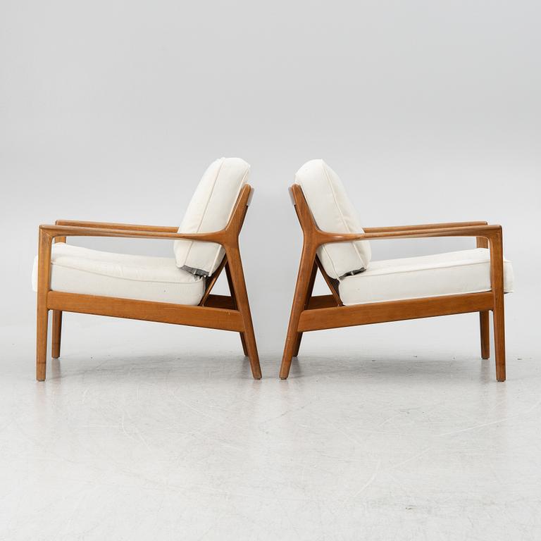 Folke Ohlsson, a pair of "USA 75" armchairs, Dux 1960s.