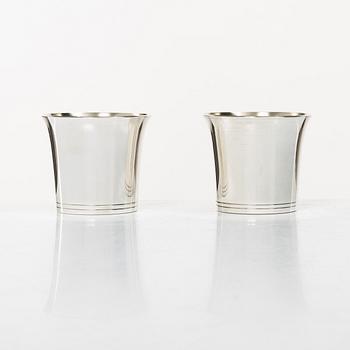 A set of eight Swedish silver beakers, mark of K. Torndals Jewellers Ltd, Stockholm 1958.