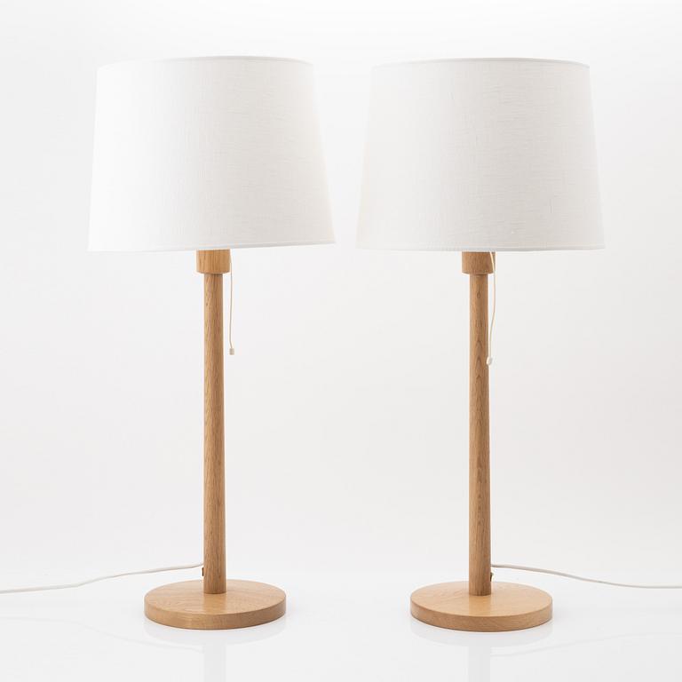 Uno & Östen Kristiansson, a pair of oak table lights, Luxus, Vittsjö.