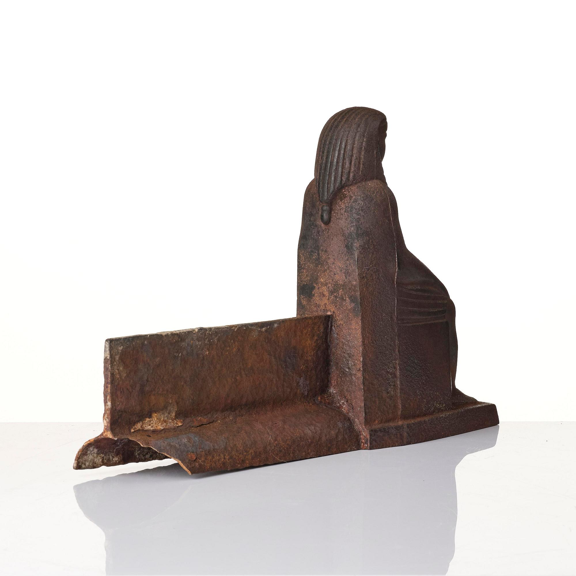 A pair of French Empire cast iron chenets, first part 19th century.