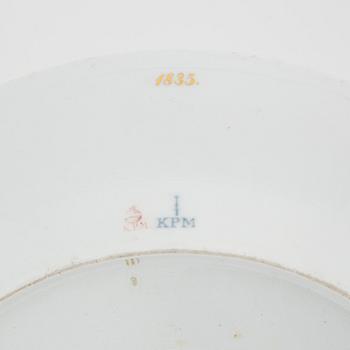 A porcelain sauce snipe and a dish, including KPM, Berlin, 19th/20th Century.