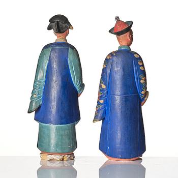 A pair of Chinese Export polychrome painted nodding head figures, Qing dynasty, early 19th Century.