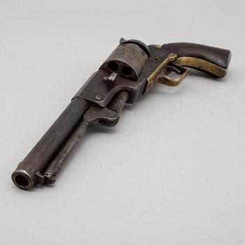 A Colt Dragoon percussion revolver no 9344 manufactured 1850.