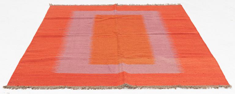 A persian kilim rug, approximately 243 x 179 cm.