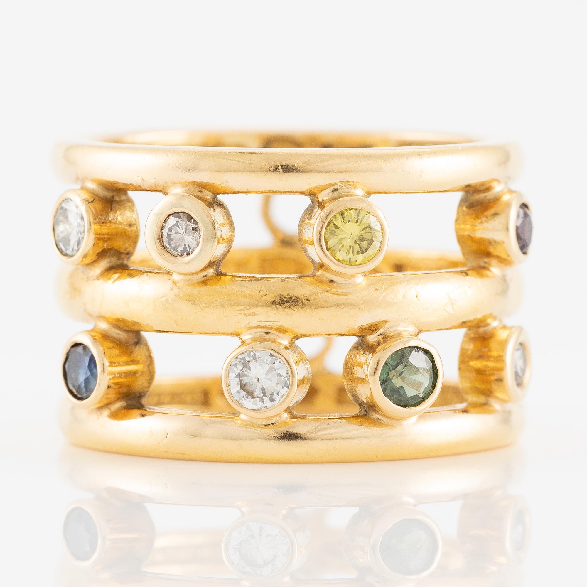 Ring 18K and 23K gold with diamonds in various colours.