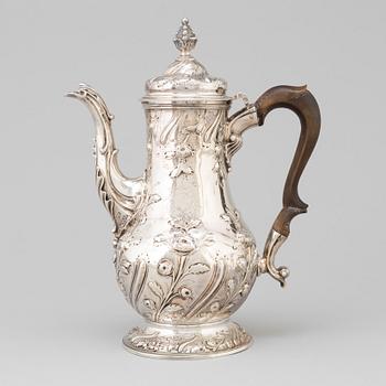 An English 18 th century silver coffee-pot, mark of Benjamin Gignac, London 1763.