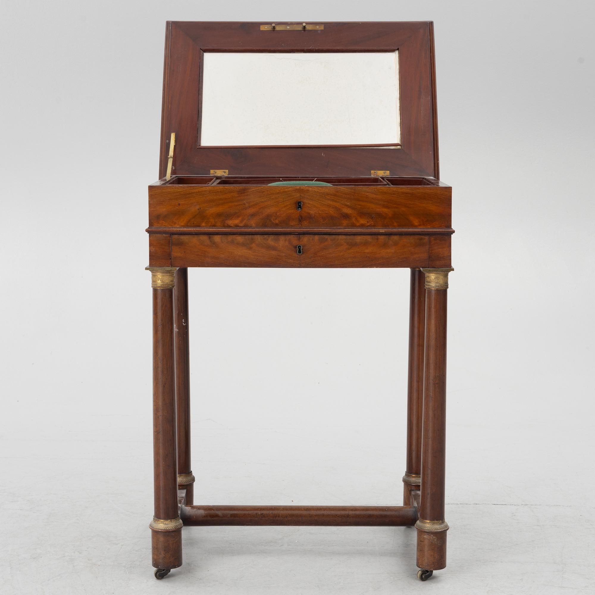 A French Empire mahogany sewing table, first part 19th century.