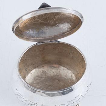 A silver sugar box, early 20th Century.