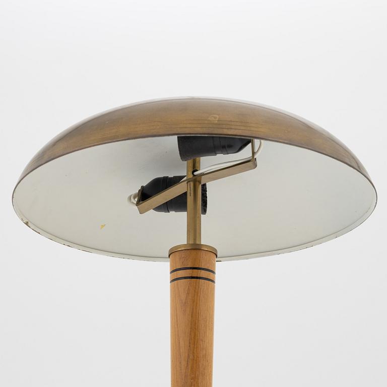 A Swedish Morden brass and elmwood table light, 1940's.