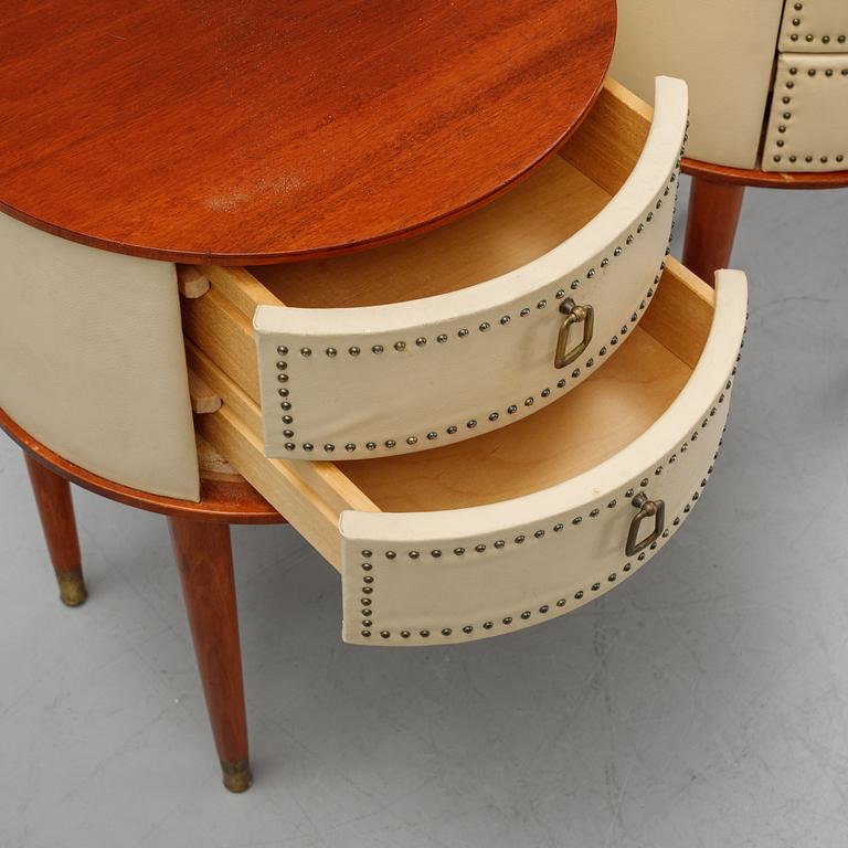 A pair of mid 20th century bedside tables.