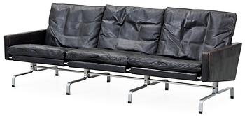 A Poul Kjaerholm black leather and steel base "PK-31-3" sofa, maker's mark E Kold Christensen, Denmark.