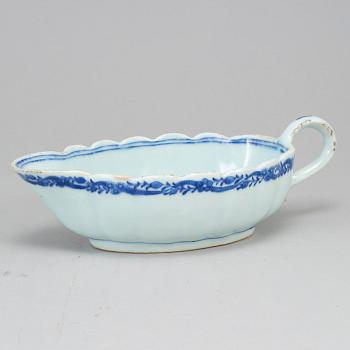 Two blue and white serving dishes and a sauce boat, Qing dynasty, Qianlong (1736-95).