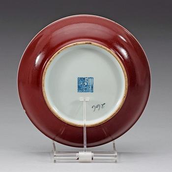 A 'sang de boef' glazed dish, Qing dynasty, with Qianlongs seal mark.