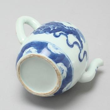 A 20th century porcelain tea pot.