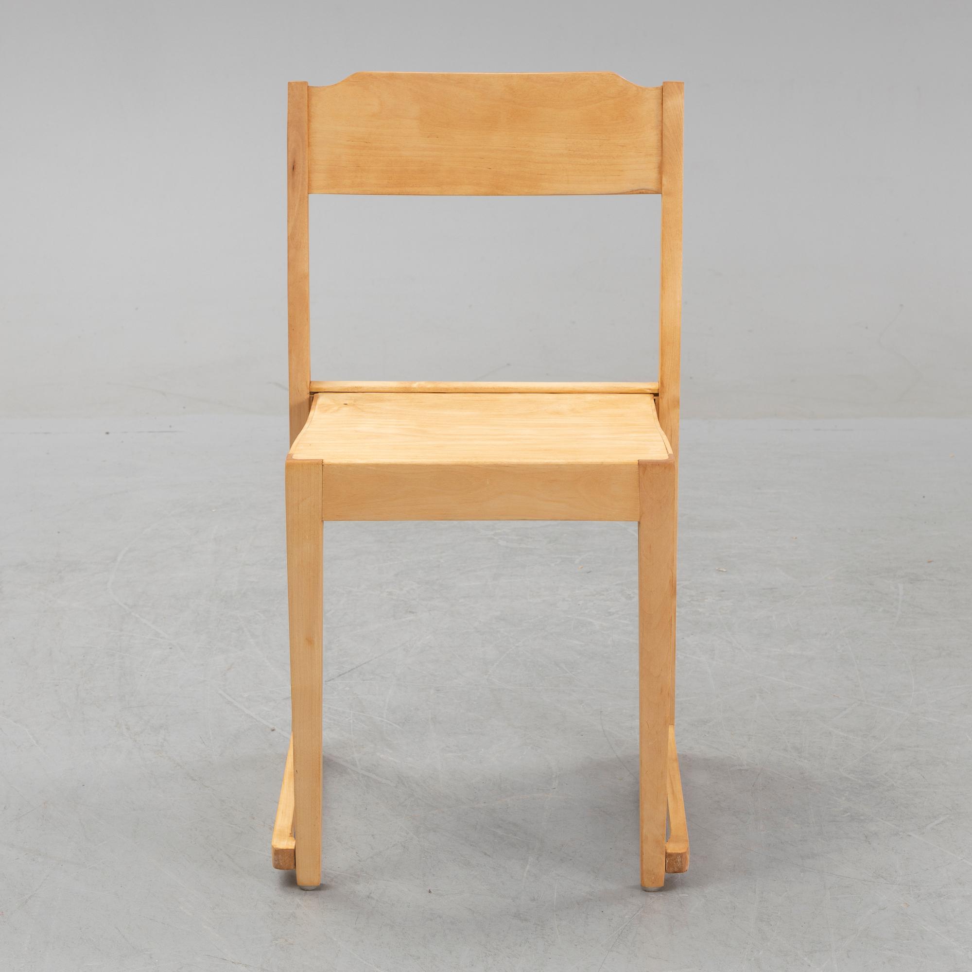 A set of five stackable birch chairs, mid 20th Century.