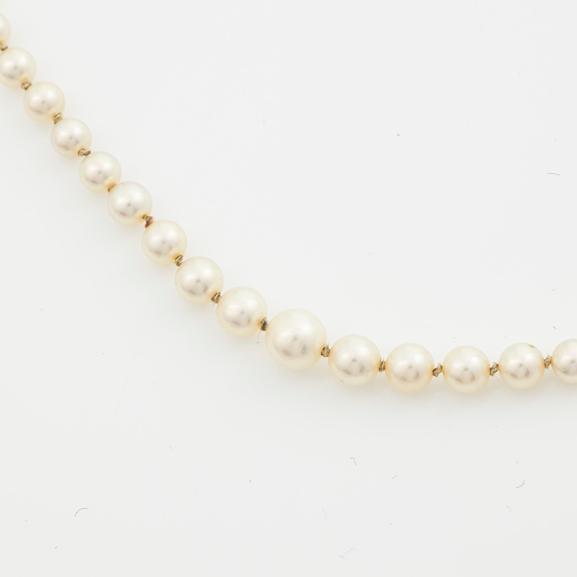 Collier odlade pärlor lås 18K guld.